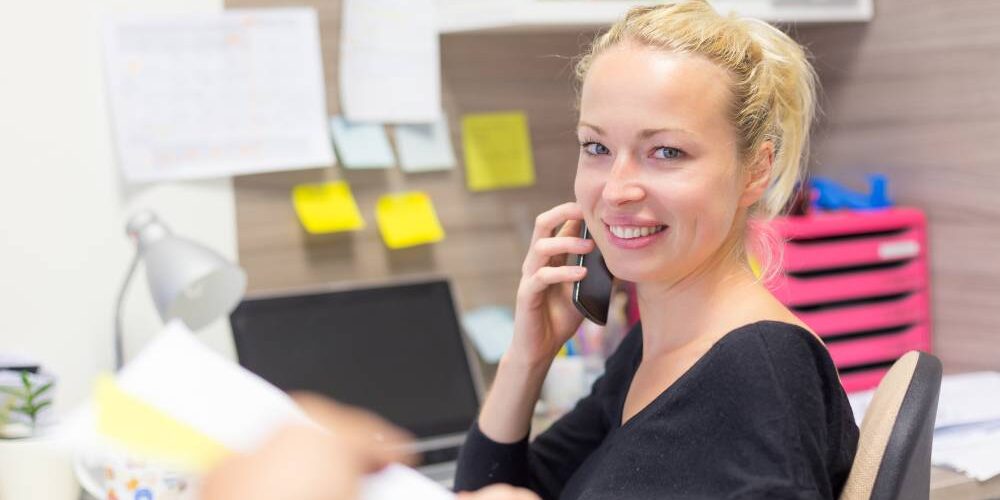 bookkeeper making phone calls